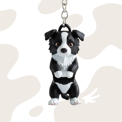 Brelok w kształcie Border Collie w kolorze czarno-białym, wykonany z ekologicznego materiału PLA, idealny do kluczy i jako prezent.