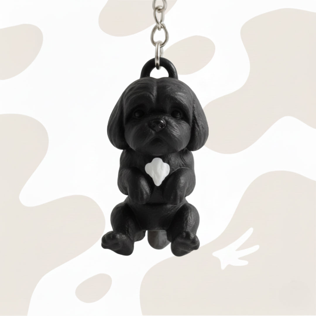 Brelok w kształcie Shih Tzu wykonany z biodegradowalnego materiału PLA, długość około 9 cm, w kolorze czarnym z białym krawatem doskonały dodatek do kluczy lub torebki.
